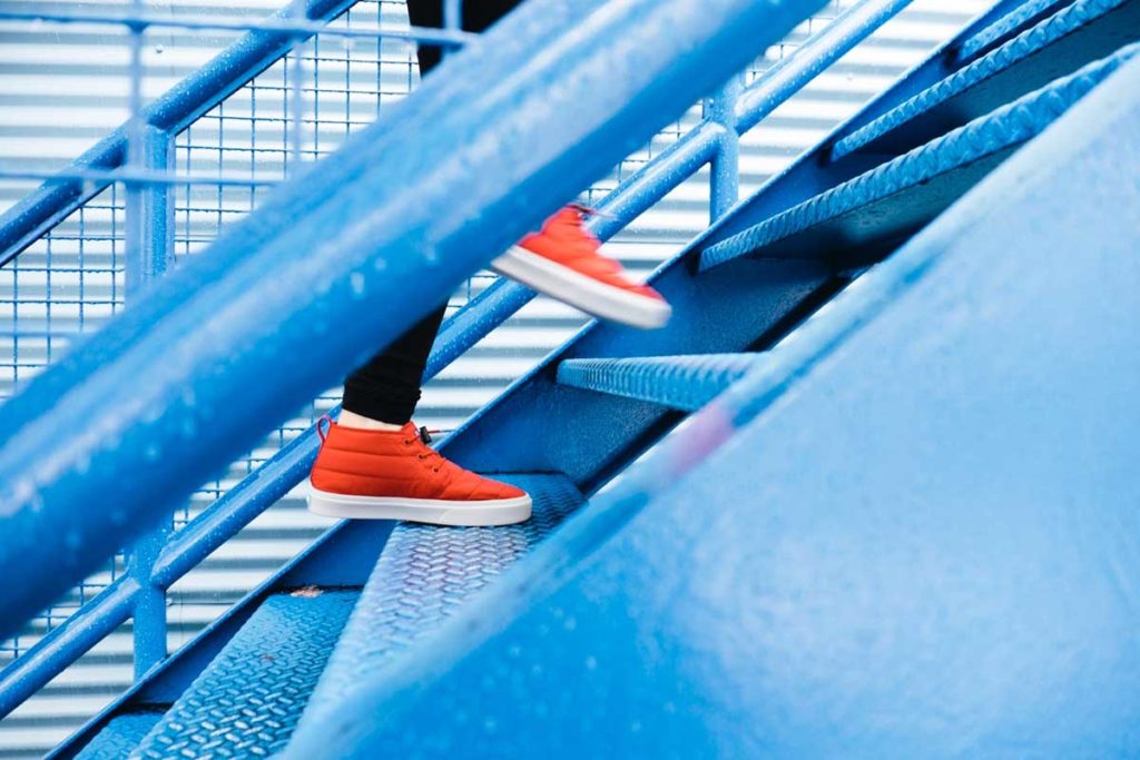 a person walking up a set of steps